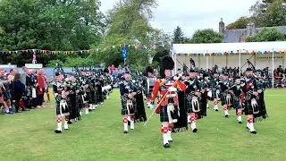 Drum Major leads the Lonach Pipe Band march in for Beating Retreat at 2025 Lonach Highland Games