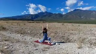 Spontaneous Yoga on the side road in jeans