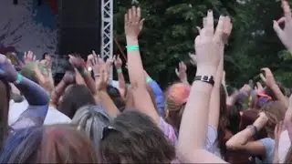 Crowd of young people dancing wildly, jumping to music, enjoying show on stage. Stock Footage