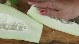 Cutting unripe papaya