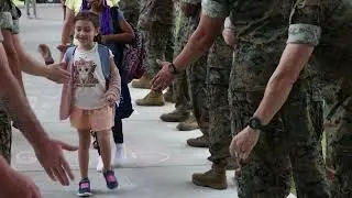 Quantico Students High-Five Back to School