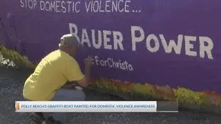 Folly Beach's graffiti boat painted for domestic violence awareness