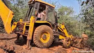 Road Work Mastery: JCB in Action on Stone