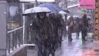 Madrid sees first snow fall in a decade