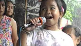 Little girl singing in the rain, Kate Francesca Campo sings Alamid's Your Love