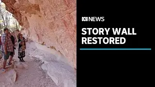 Towering indigenous art story wall restored in outback Queensland | ABC News