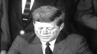 President John F Kennedy signs Limited Nuclear Test Ban Treaty at Treaty Room of ...HD Stock Footage