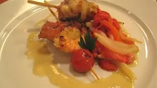 Brocheta de rape con pimientos asados