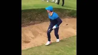 Rory McIlroy takes 6 to get out of a greenside bunker at the 