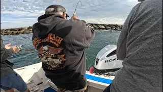Taking People Out To Fish The Long Beach Break Wall