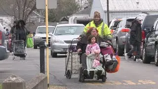 Hundreds line up at Louisville food pantry following power outages from storm