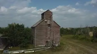 Old prairie grain elevator on Highway 41 near Wakaw, Saskatchewan. August, 2023.   