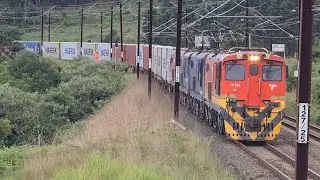 South African Railways class 18E locomotives heading towards JHB in the KZN midlands.