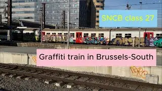 SNCB class 27 covered in graffiti arriving at Brussels-South station