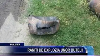 RANITI DE EXPLOZIA UNOR BUTELII