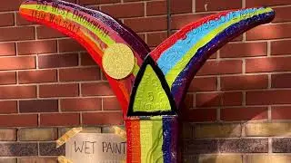 Painting Progress Pride mileposts on the National Cycle Network
