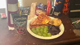 Cheese Pizza, Chocolate Chip Cookie, Blue Corn Chips, Green Grapes, and Capri Sun Fruit Punch Juice