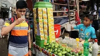 Hard working Amazing small boy selling street food lemon juice & grapefruit by 8 years children