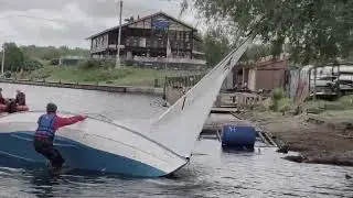 Manchester Seniors Sailing Club -  righting a capsized wayfarer dinghy.