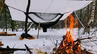 Wilderness Survival Skills - Build a Fire in freezing cold rain, hammock setup in bad weather