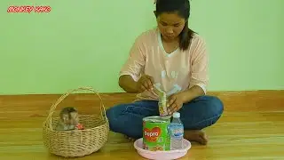 Tiny Baby Nina Sitting In Basket Wait Mom Prepare Milk For Drink