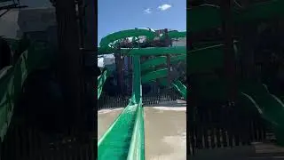 Green straight down body slide at iberostar paraiso lindo in Cancun Mexico