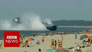 Russia: Military Hovercraft Shocks Sunbathers - BBC NEWS