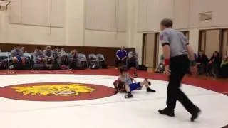 Michael Schiltz wrestling 80lbs for Herget middle school.