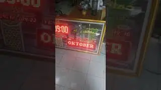 Jam digital JWS, bingkai besar. Running Text dan 7 Segment.