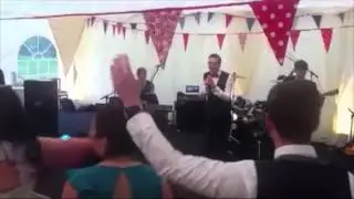 The Bandeoke Band perform with a Festival Groom!