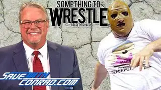 Bruce Prichard shoots on John Tenta as Golga