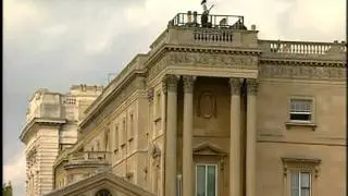 Brian May on the roof of Buckingham Palace
