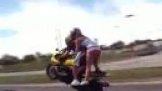 wheelie on motorcycle- tandem stunt