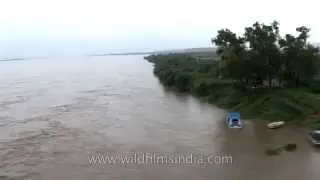 Crossing the mighty Brahmaputra in monsoon spate
