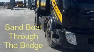 Sand boat through The Bridge (Guernsey)