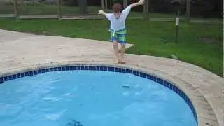 Funny boys jumping into cold pool