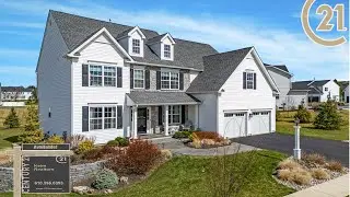 Welcome to the breathtaking Breckenridge Grande Farmhouse in the prestigious Millbrook Estates!