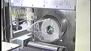 ARPAC's 105FFS Horizontal Shrink Bundler Packaging Rolls of Paper (1999)