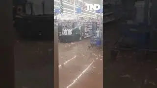 Rain and hail crash through roof of a Walmart in Wisconsin #shorts