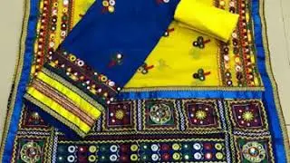 Beautiful embroidered dress material with glass mirror work.. With price and details