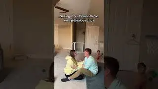 baby reacts to parents showing affection