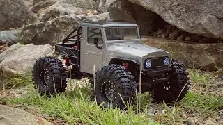 Austar Hobby AX-8560  1/18 upgrade with Injora body , wheels, tires and shocks big improvement.