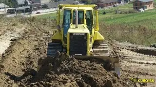 Caterpillar D6N - dozer pushing dirt