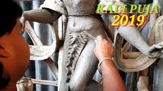 GOD KALI, BHABOTARINI PRATIMA/IDOL . BHABOTARINI MURTI MAKING PROGRESS AT RAYNAGAR. USING CLAY