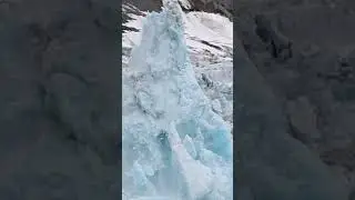 Gigantic ice pillar rises out of the sea #glacier #calving #ice #collapse #climatechange