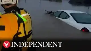 Cars submerged in water after severe floods hit California