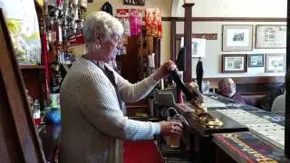Pulling a pint of Bathams at the Bull and Bladder