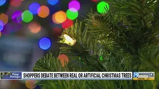 Shoppers debate between real or artificial Christmas trees