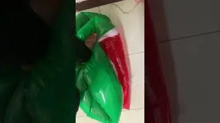 Giant inflatable watermelon rapid deflate and stomp