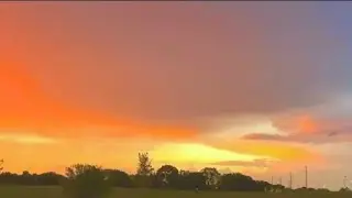 Thundering Sunset With Rainbow